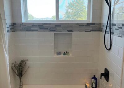Modern country farmhouse new bathtub in renovated bathroom.
