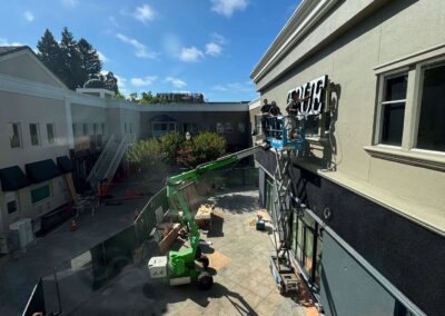 Putting up the True West Film Center Marquee