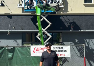 Putting up the True West Film Center Marquee